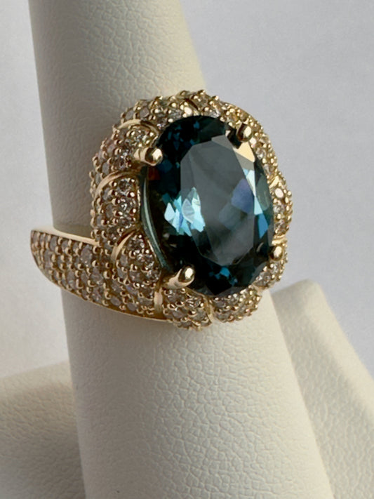 7 Carat Oval-Cut London Blue Topaz and Diamond Halo Ring