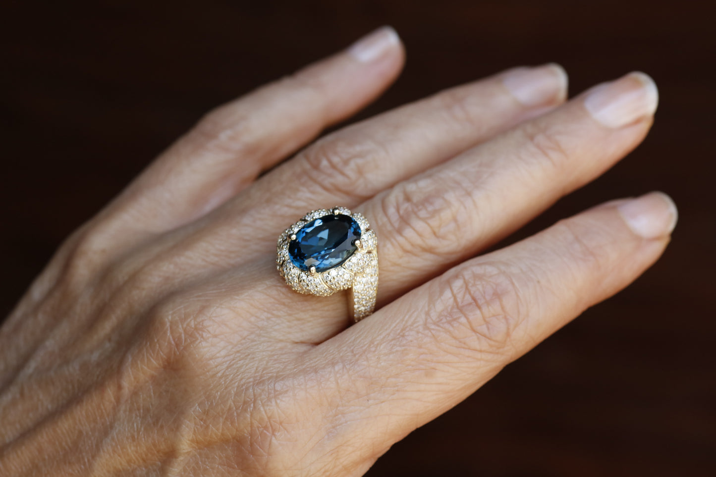 7 Carat Oval-Cut London Blue Topaz and Diamond Halo Ring